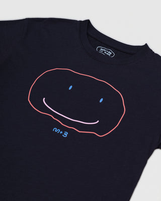 WEARING A FLAT SMILE SUPIMA® T-SHIRT