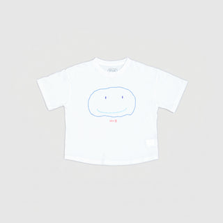 WEARING A FLAT SMILE SUPIMA® T-SHIRT